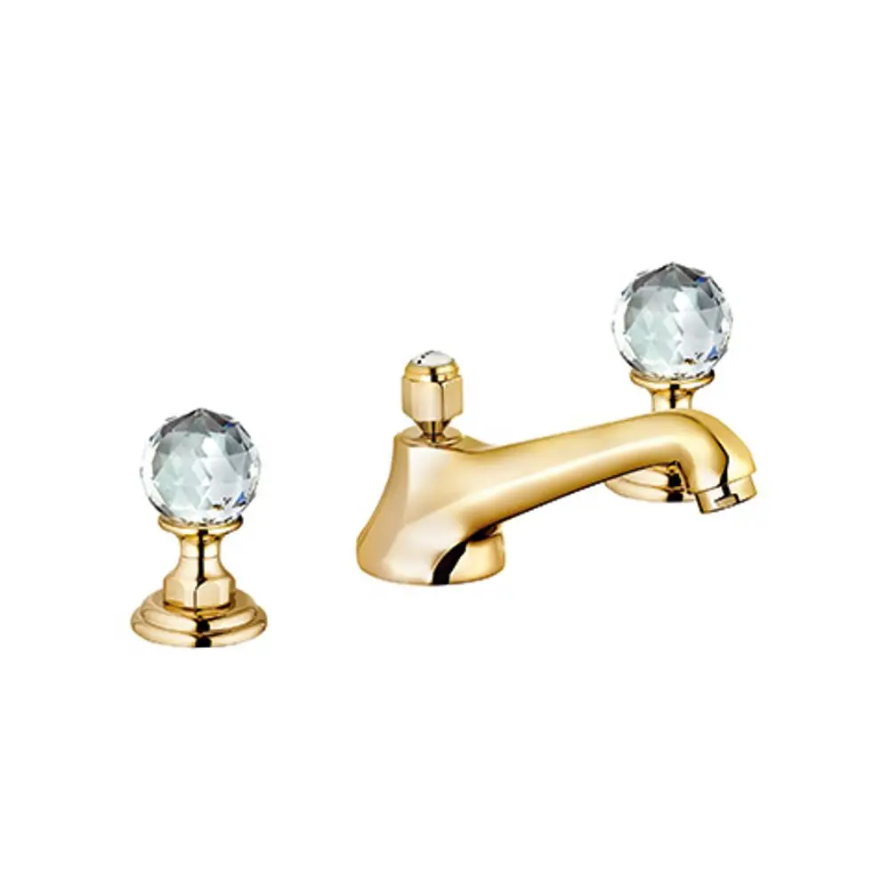 Kludi Wasserhahn mit drei Löchern, goldene Oberfläche und Kristallgriffen, mit einer Ausladung von 145 mm.